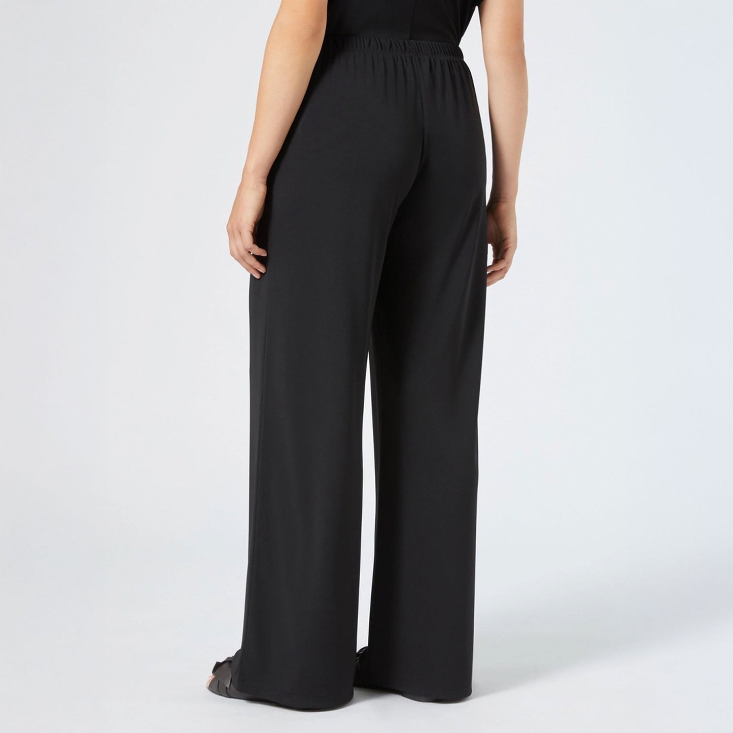 Persona pantalone nero UNNO